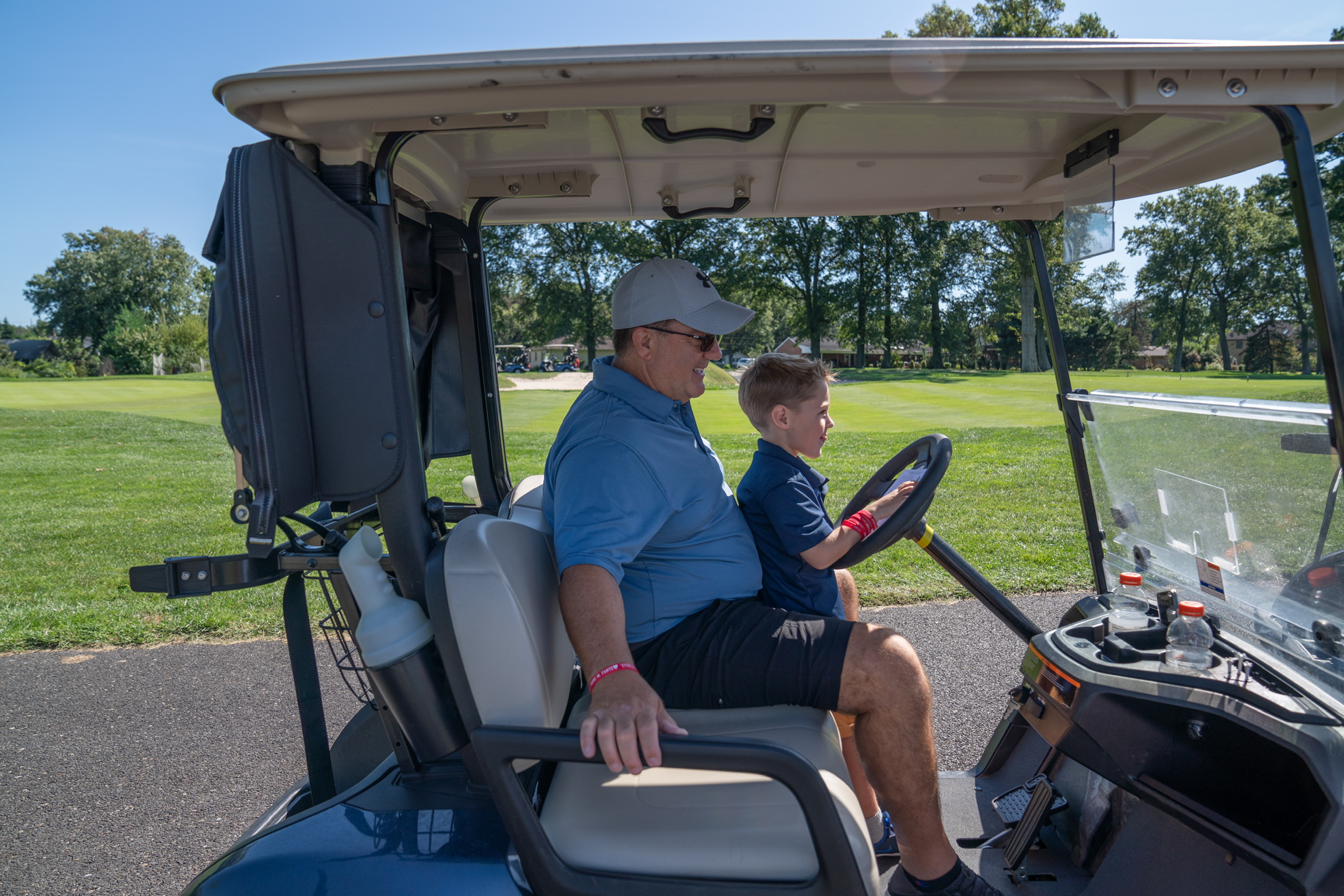 2021 Golf Outing Riding In The Golf Cart