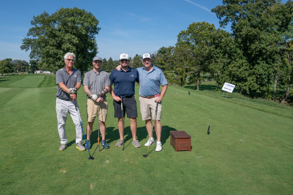 2021 Golf Outing Group Photo On The Green