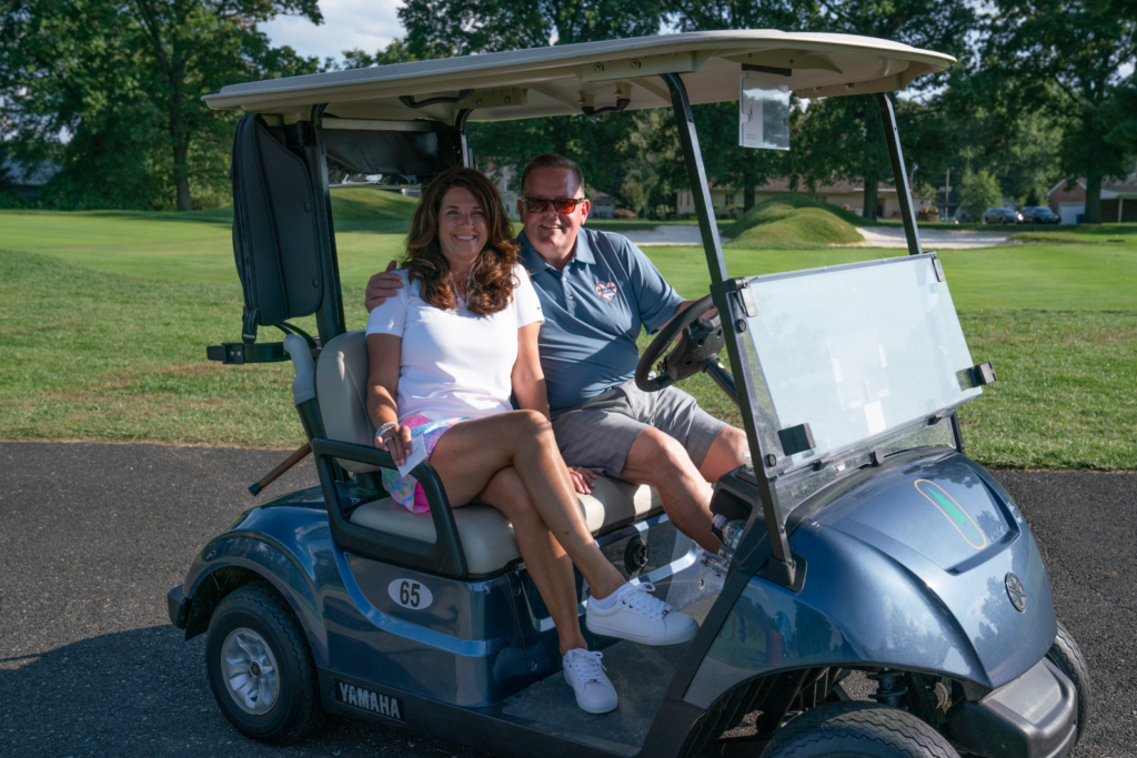 Dane Fante Golf Outing - Mrs. Fante & Friend On Golf Cart