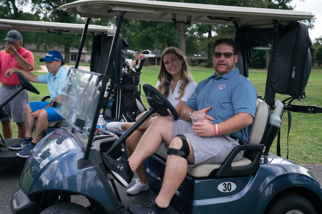 Dane Fante Golf Outing - Friends Relaxing In Golf Carts