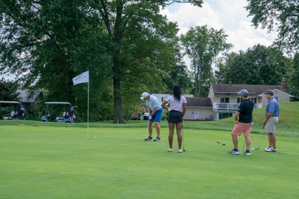 Dane Fante Golf Outing - Friends Cheering On Their Teammate