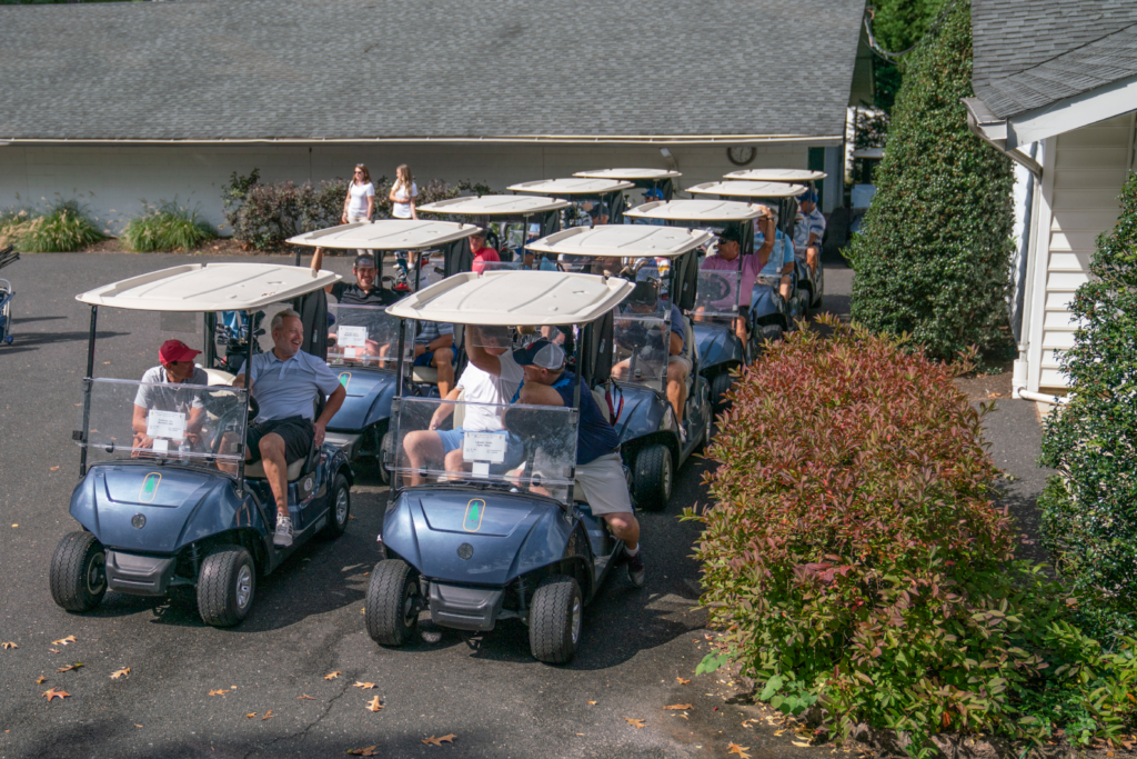 Dane Fante Golf Outing - Friends Chatting & Picking Their Golf Carts