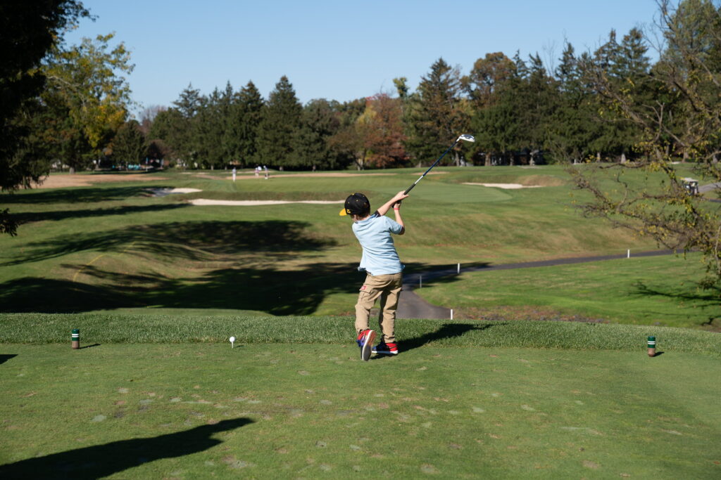 Blake taking part in hole in one