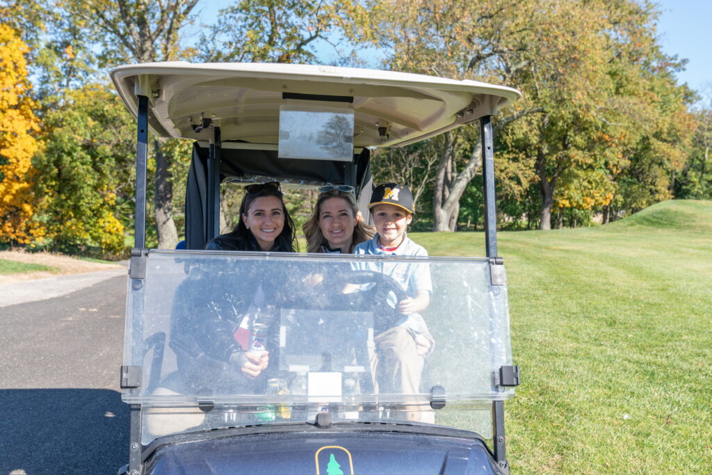 Another of Blake driving the golf cart